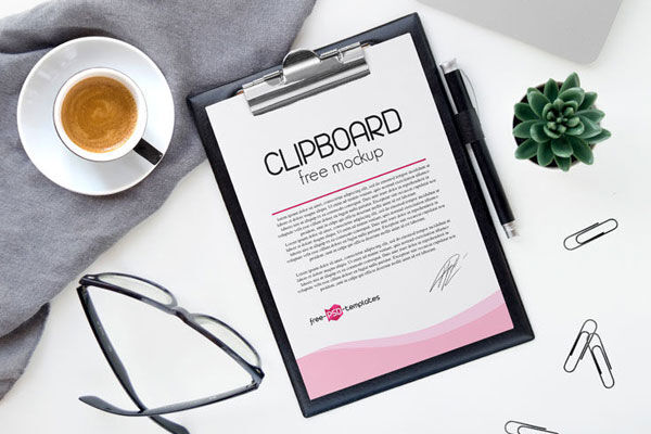 2 Clipboard Mockups with Pencil, Pins and a Cup of Coffee and Other Items