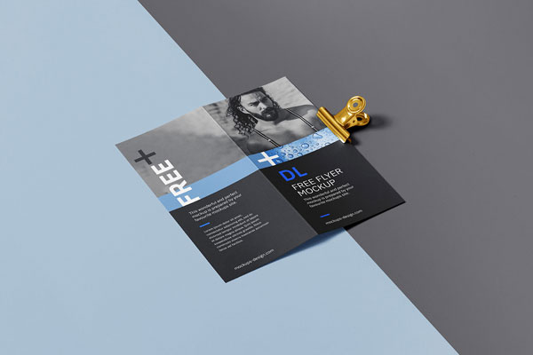 2 Mockups of Open Bi-fold DL Flyer / Brochure with a Clip