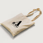 2 Mockups of Tote Bag Laid in Top and Perspective Views