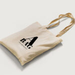 2 Mockups of Tote Bag Laid in Top and Perspective Views