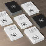 2 Mockups Showing Perspective View of Business Cards in Stacks