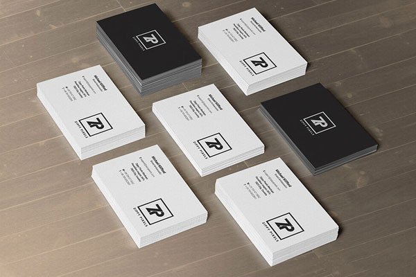 2 Mockups Showing Perspective View of Business Cards in Stacks