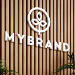 2 Shots of Logo Mockup on Wooden Panels