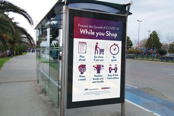3/4 View Bus Stop Advertising Poster Mockup in Urban Setting