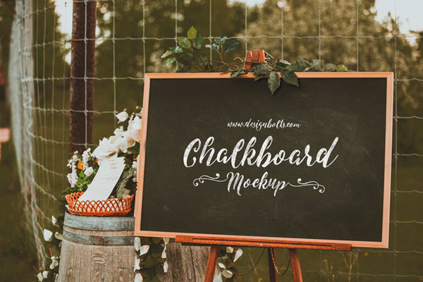3/4 View Chalkboard in Outdoor Setting Mockup with Flowers