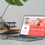 3/4 View MacBook Pro on Table Mockup with Books