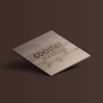 3/4 View of a Square Coaster With an Engraved Logo Mockup