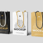 3 Eco Leather Gift Bags Mockup Standing Next to Each Other