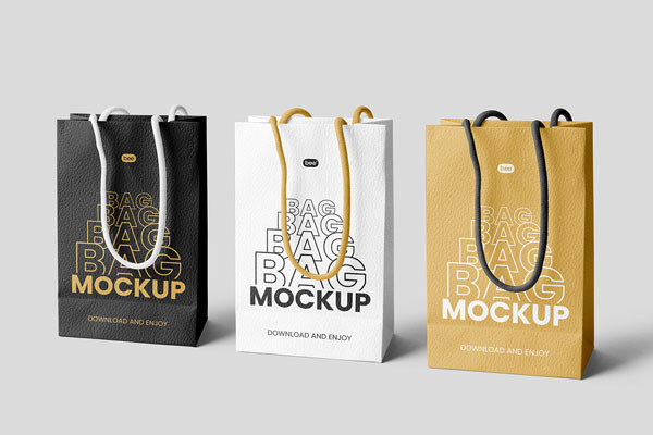 3 Eco Leather Gift Bags Mockup Standing Next to Each Other
