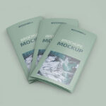 3 Mockups Including Tri-fold Brochures in Different Positions