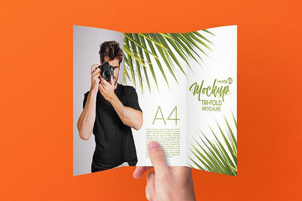 3 Mockups of Tri-Fold A4 Brochure Featuring One Held by Hand