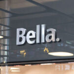 3D Silver Logo on a Glassy Facade Shop Mockup