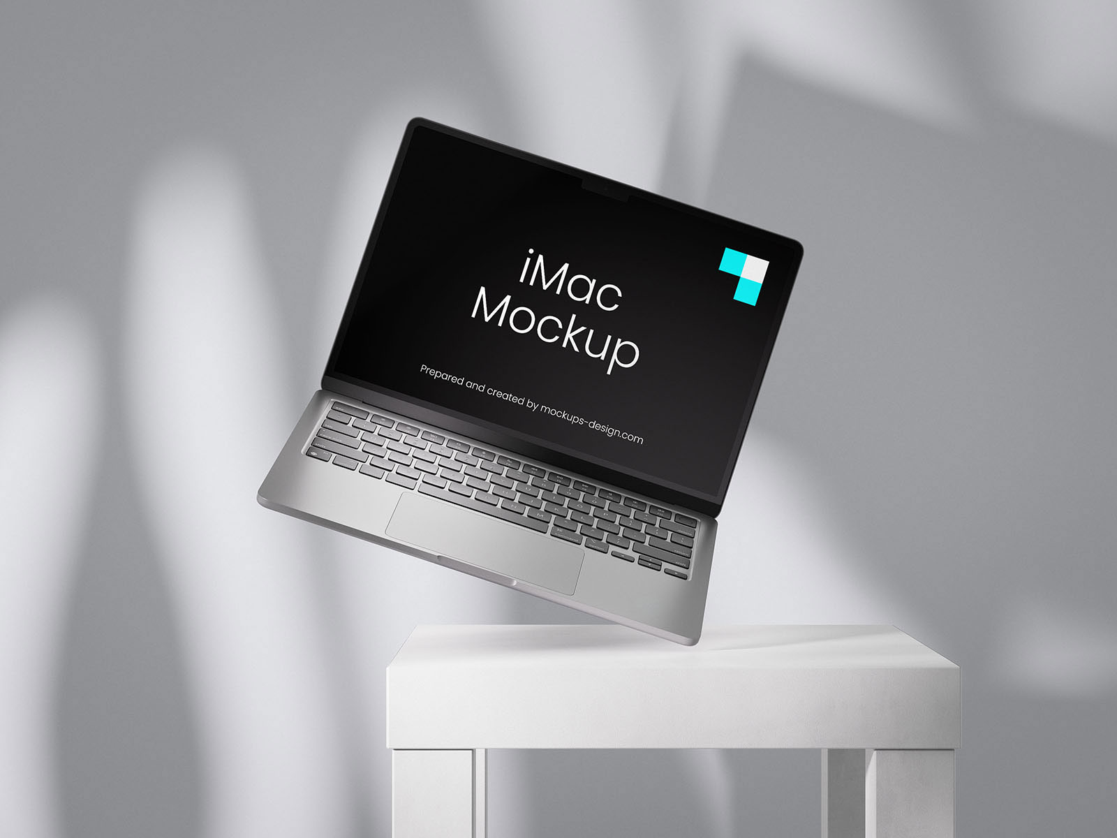Free 4 Showcases of MacBook Mockup on Table with Shadows PSD Template