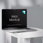 4 Showcases of MacBook Mockup on Table with Shadows