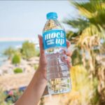 4 Sights of Hand Holding Water Bottle Mockup