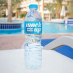 4 Sights of Hand Holding Water Bottle Mockup