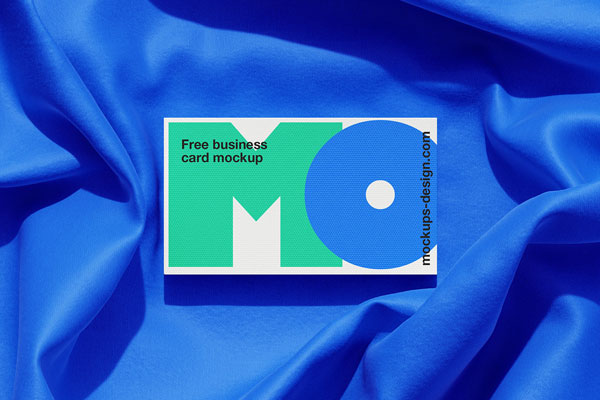 4 Views of Business Cards Mockup on Fabric Background