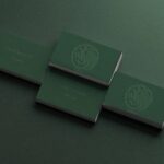 5 Business Cards Mockups with Embossed Text Effect in Varied Views