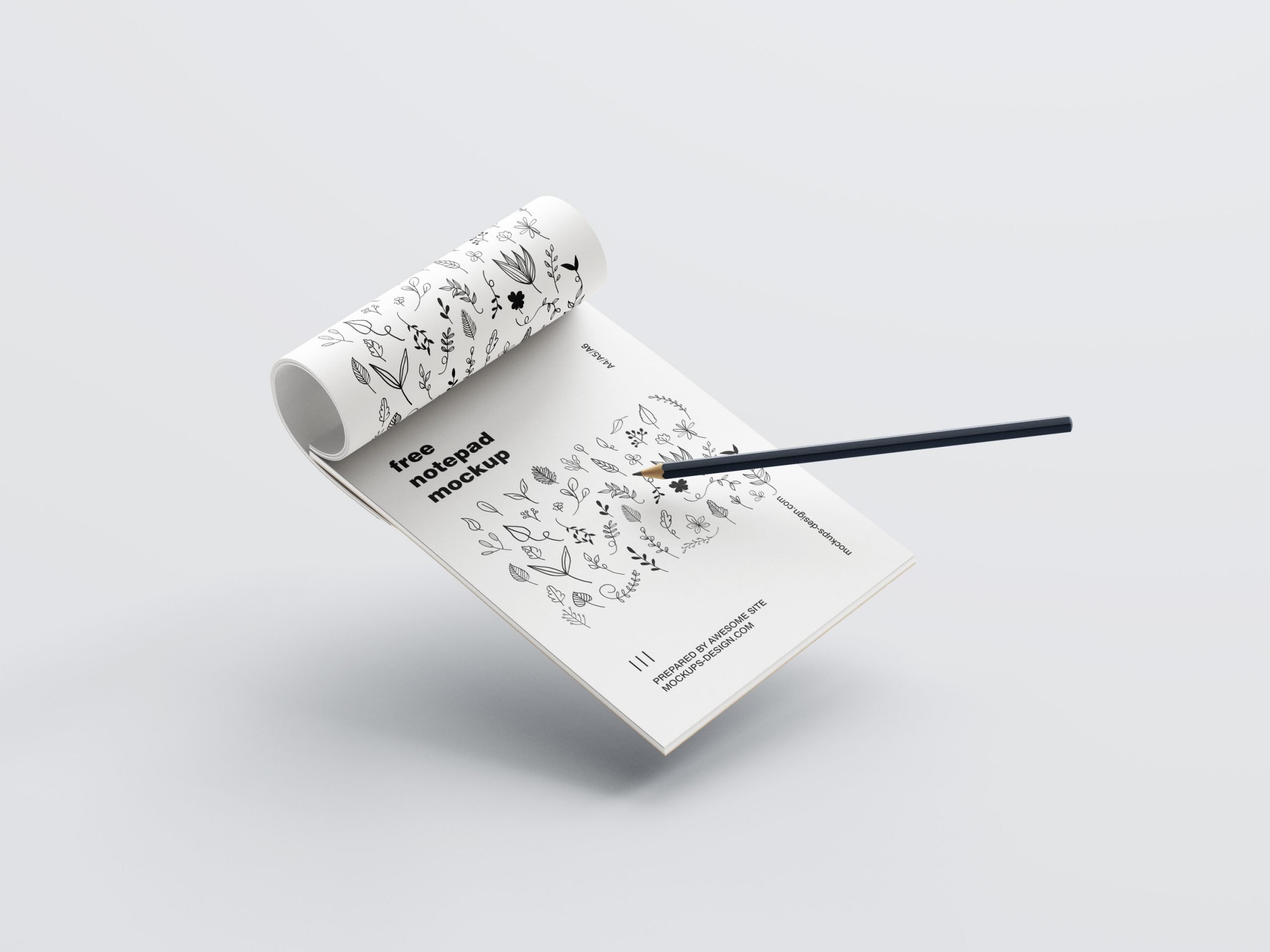 5 Mockups of Notepad with Pencil in Various Perspective Views FREE PSD