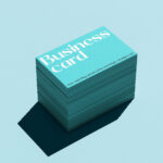 5 Mockups of Piles of Business Cards with Hard Shadow