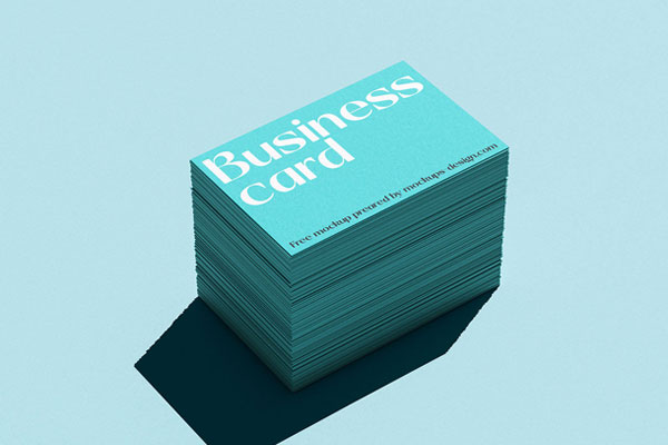 5 Mockups of Piles of Business Cards with Hard Shadow
