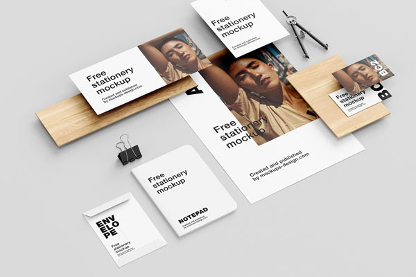 5 Mockups of Stationery and Wooden Element in Perspective View