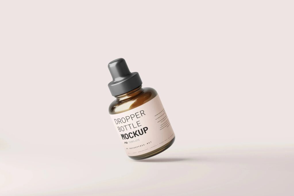 5 Mockups of Stubby Dropper Bottle in Varied Shots