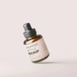 5 Mockups of Stubby Dropper Bottle in Varied Shots