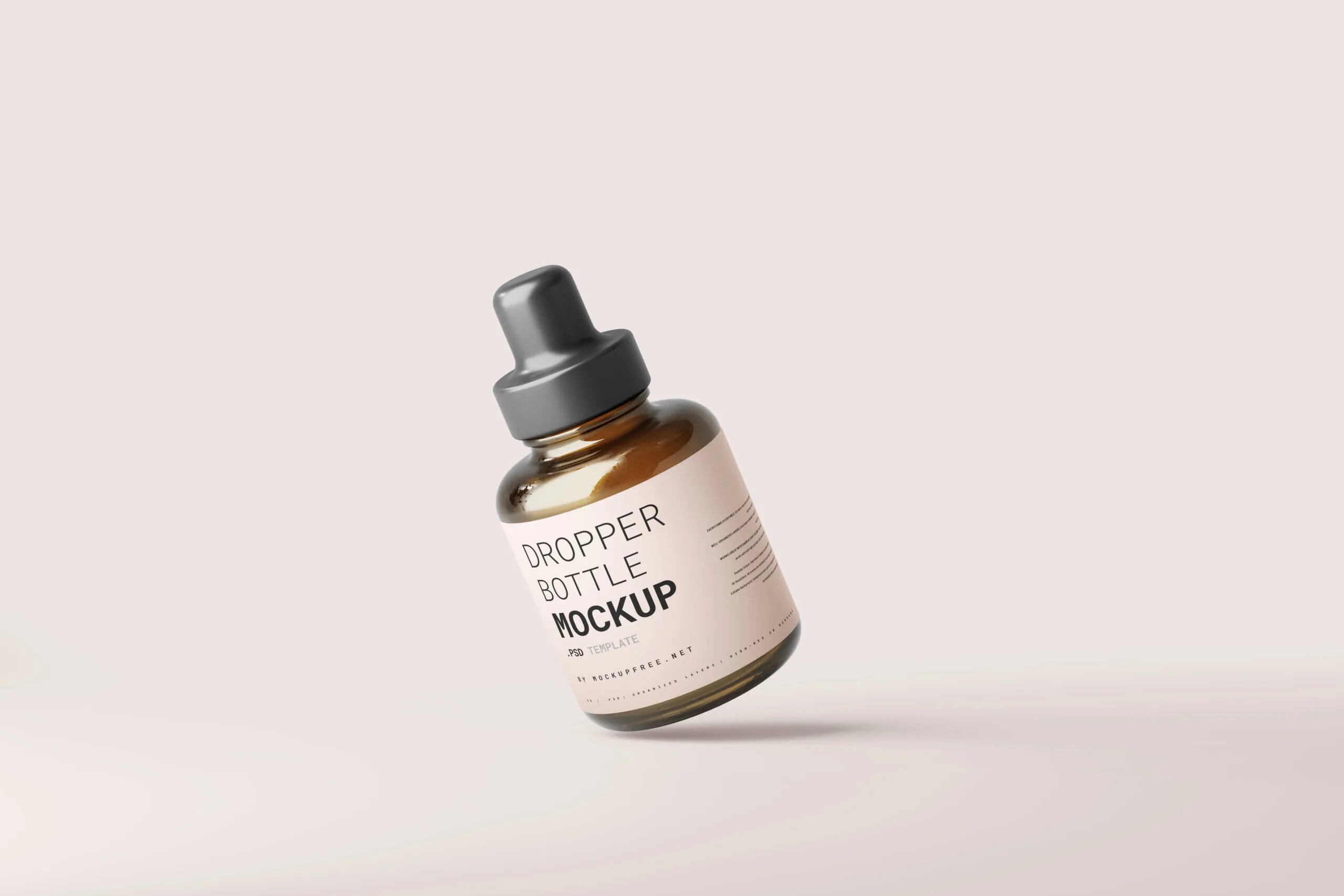 5 Mockups of Stubby Dropper Bottle in Varied Shots FREE PSD