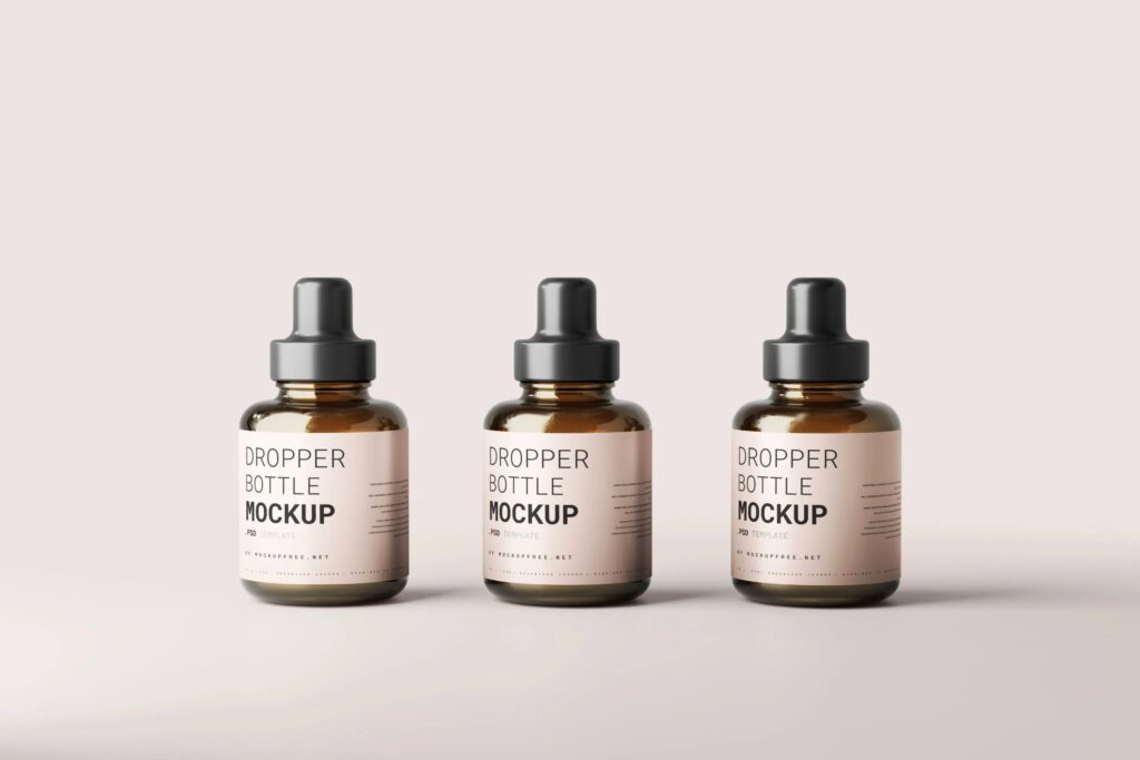 5 Mockups of Stubby Dropper Bottle in Varied Shots