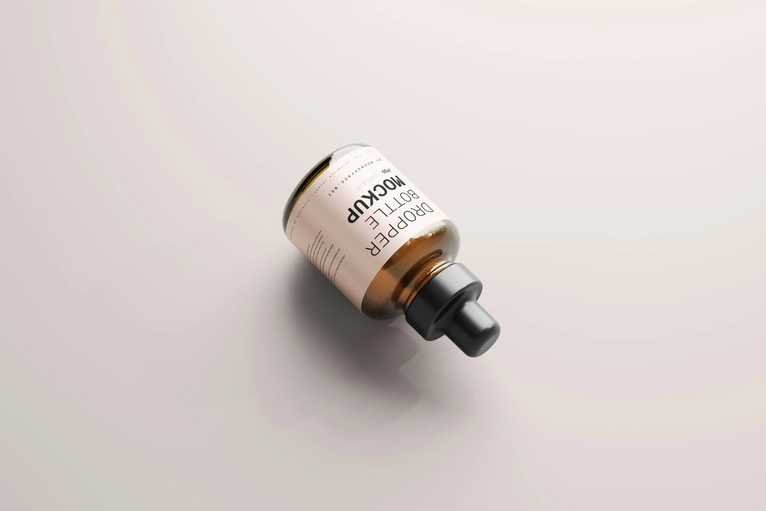 5 Mockups of Stubby Dropper Bottle in Varied Shots FREE PSD