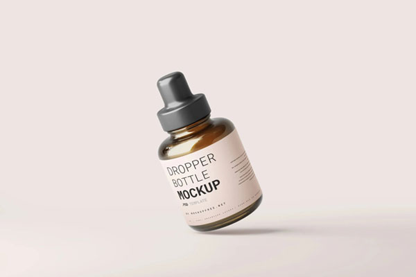 5 Mockups of Stubby Dropper Bottle in Varied Shots