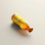 5 Orange Juice Bottle Mockups in Varied Visions