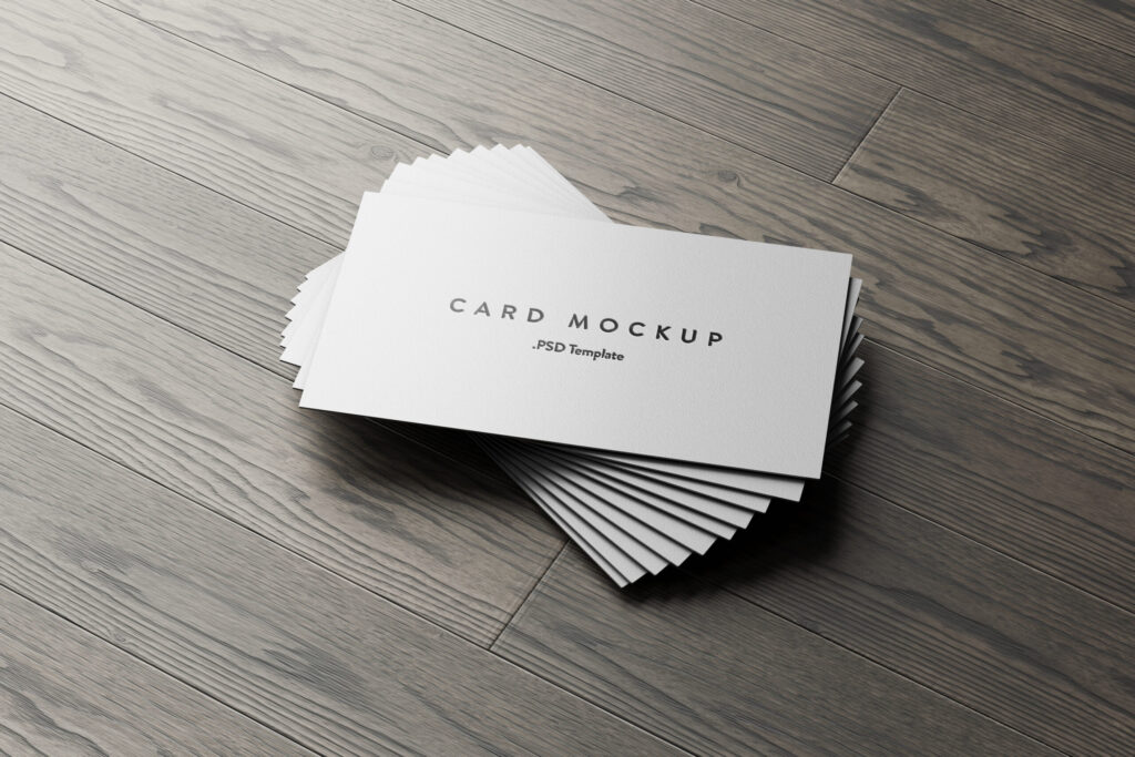 7 Business Cards Mockups Stack on Wood Background
