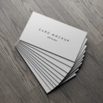 7 Business Cards Mockups Stack on Wood Background