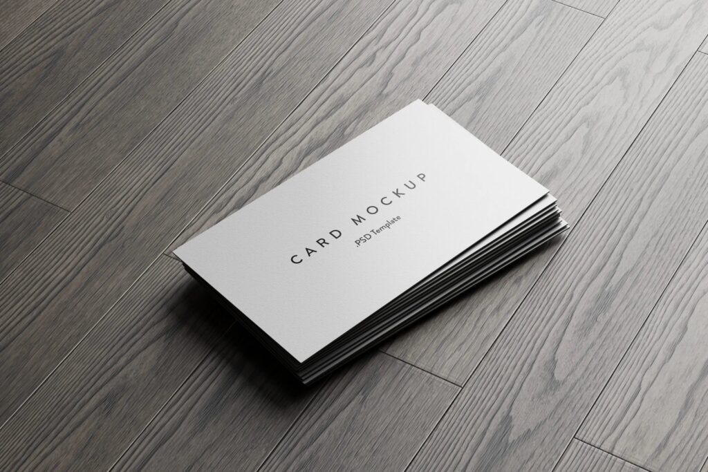 7 Business Cards Mockups Stack on Wood Background