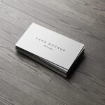 7 Business Cards Mockups Stack on Wood Background