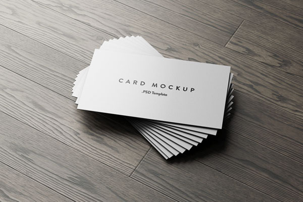 7 Business Cards Mockups Stack on Wood Background