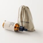 7 Mockups of Dropper Bottle with Burlap Sack