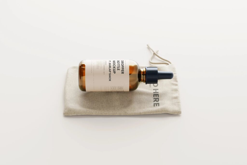 7 Mockups of Dropper Bottle with Burlap Sack