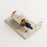 7 Mockups of Dropper Bottle with Burlap Sack