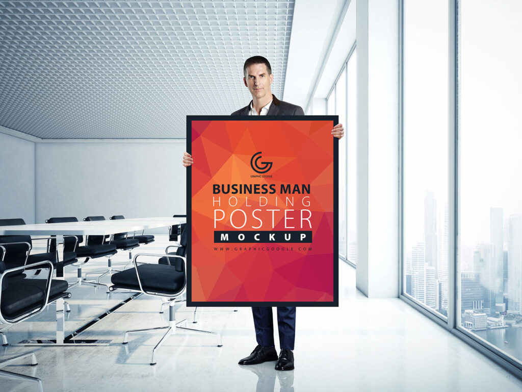 A Man Holding a Poster in an Office Mockup