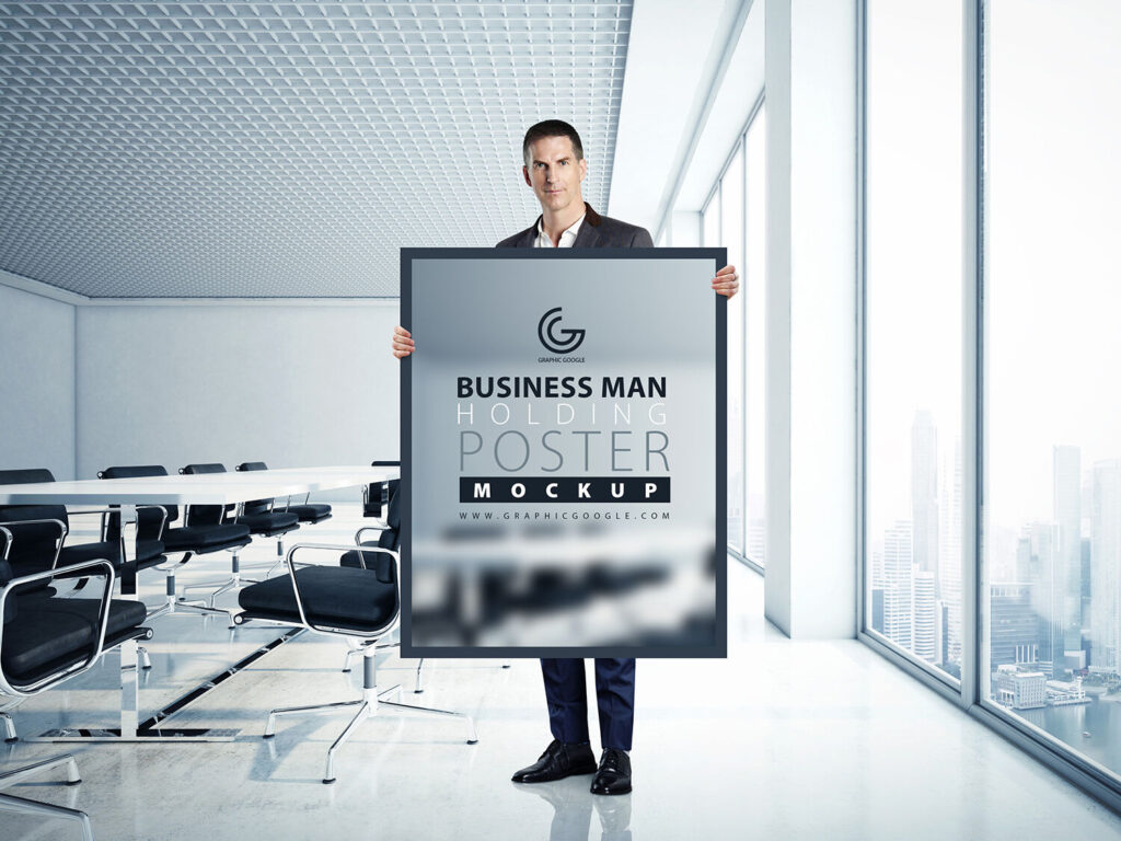 A Man Holding a Poster in an Office Mockup