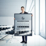 A Man Holding a Poster in an Office Mockup