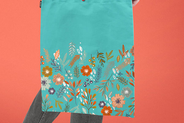A Tote Bag in a Person’s Hand Mockup