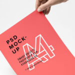 A4 Paper in a Hand Mockup