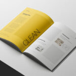 A4 Magazine Mockup Open on Minimal White Surface