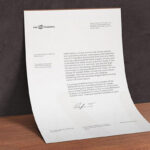 A4 Paper Leaning Against a Wall Mockup