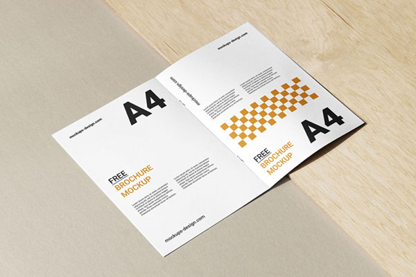 A4 Saddle Stitched Brochure Mockup with Wooden Background