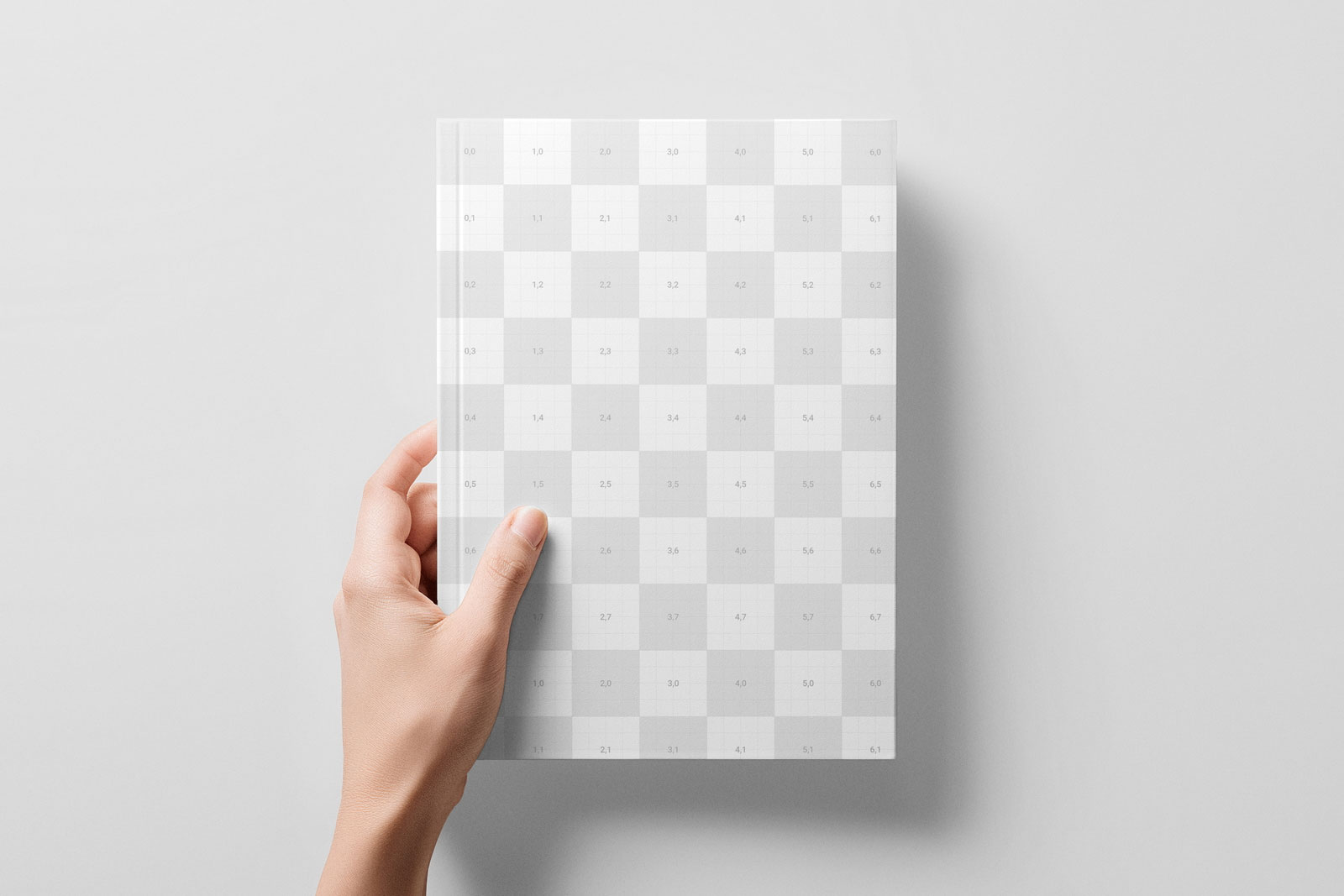 Free A5 Book Cover Mockup in Hand PSD Template